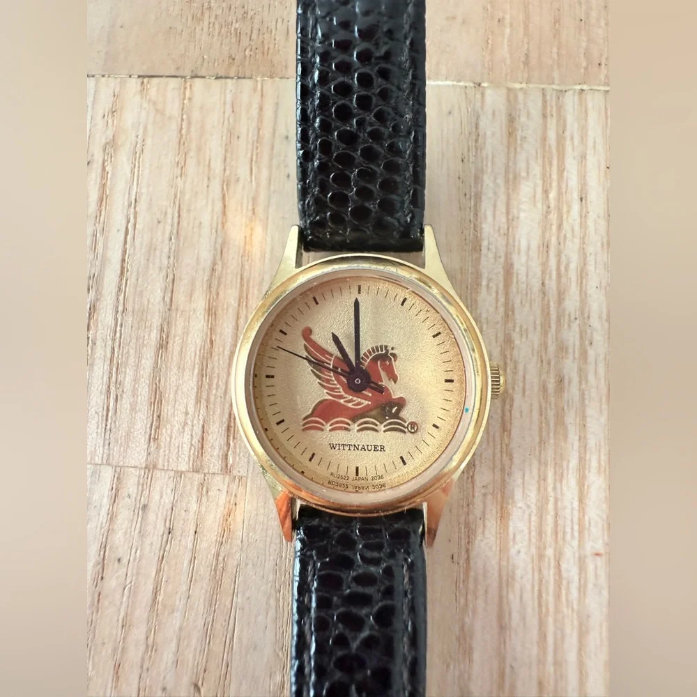 Wittnauer ladies gold tone Pegasus black leather watch NEW BATTERY